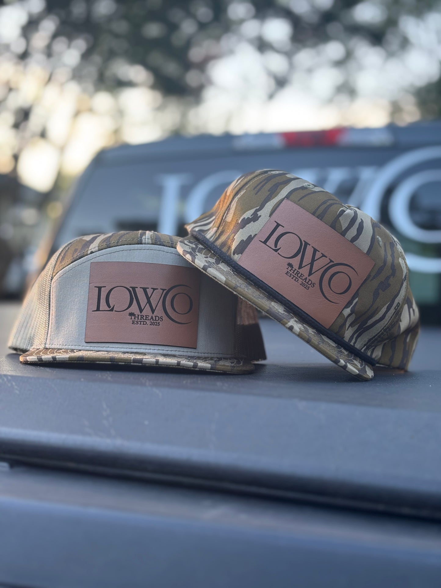 Richardson 168P Camo 7-Panel
Snapback Trucker Hat - Seven-
Panel Trucker Cap - Front Logo Leather Patch