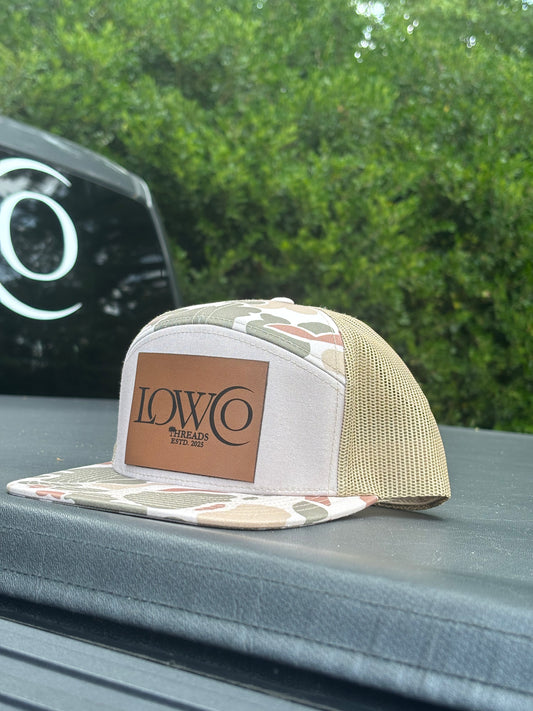 Richardson 168P Camo 7-Panel
Snapback Trucker Hat - Seven-
Panel Trucker Cap - Front Logo Leather Patch