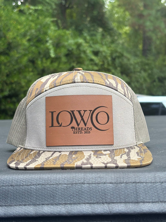 Richardson 168P Camo 7-Panel
Snapback Trucker Hat - Seven-
Panel Trucker Cap - Front Logo Leather Patch